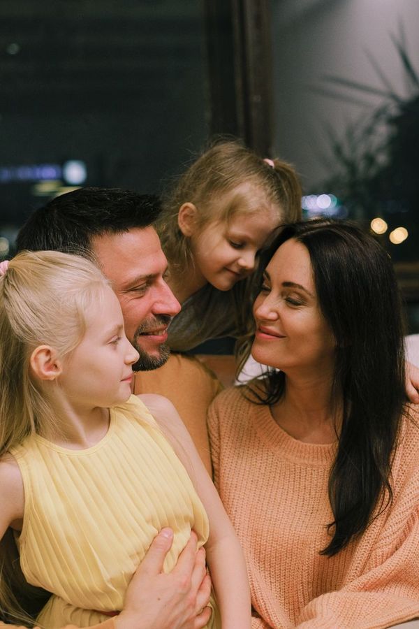 Parents and their two daughters
