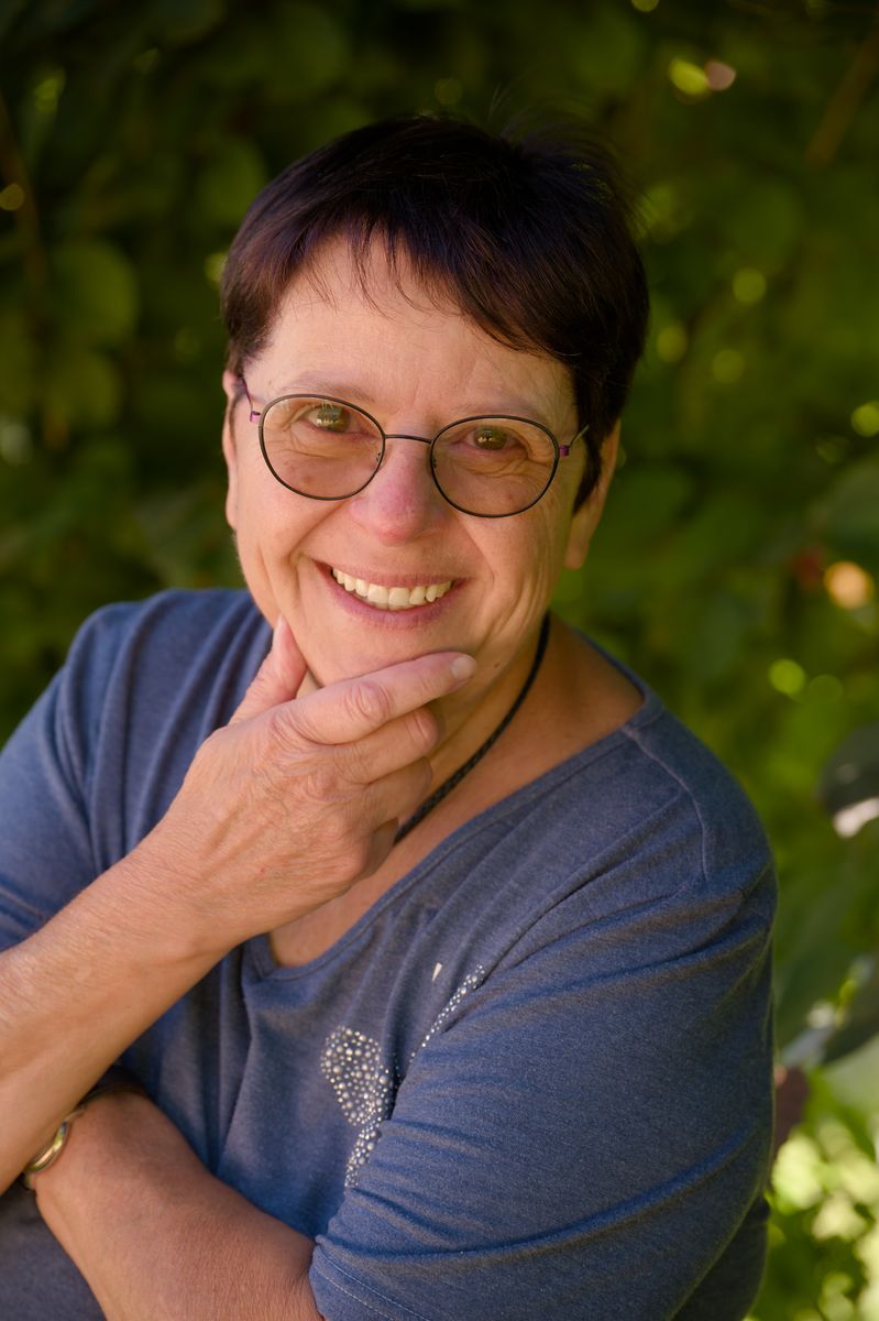 A smiling woman outdoors